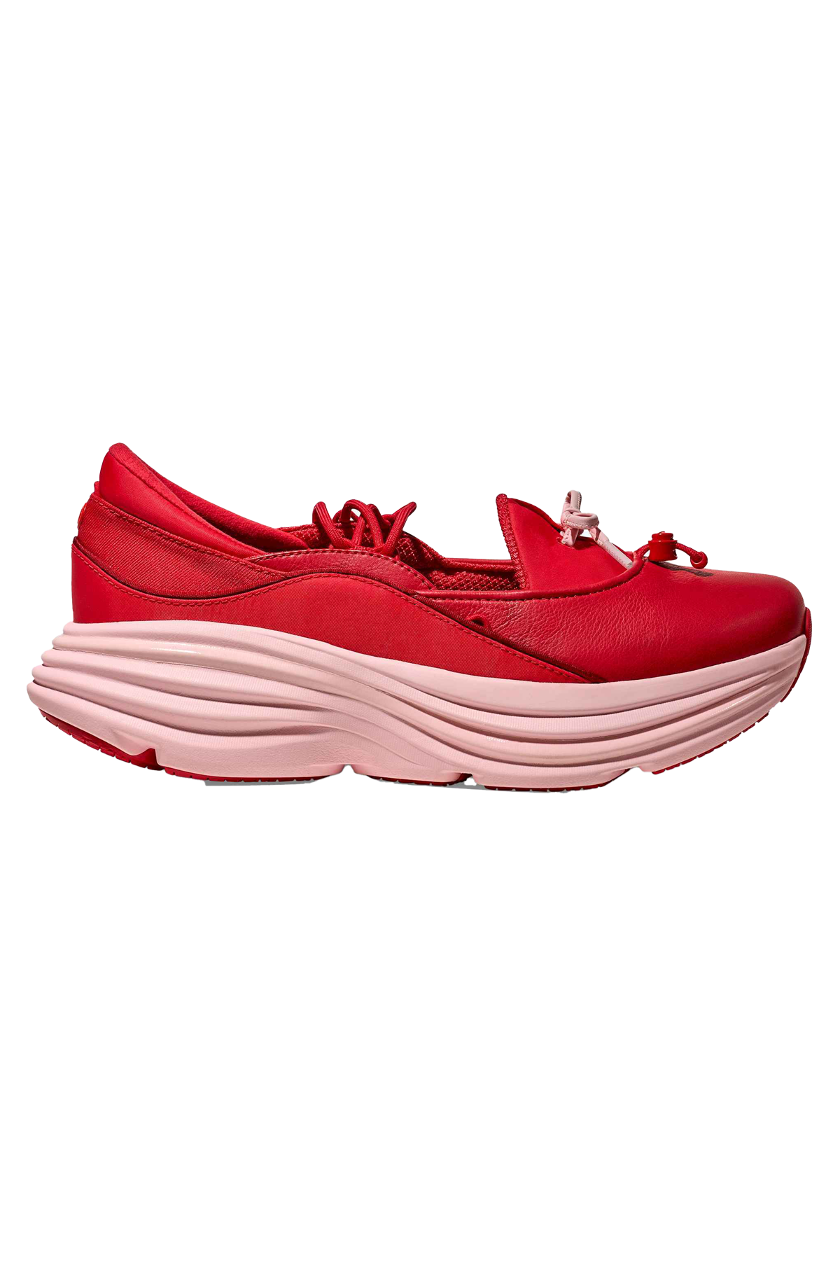 Red sneaker with a thick pink sole on