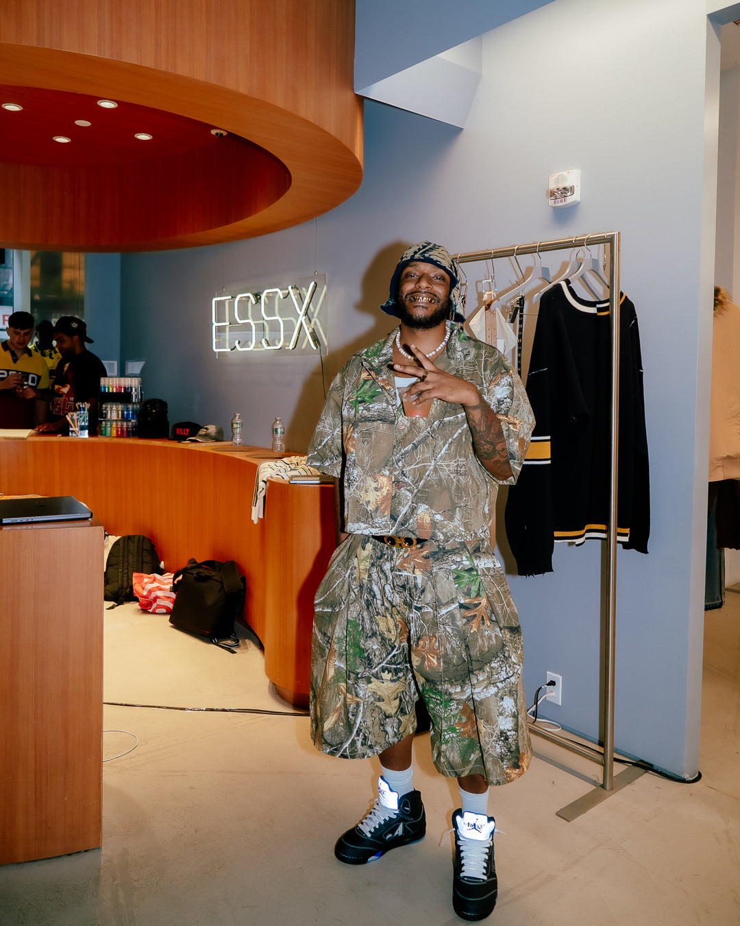 A person wearing incredibly styled clothes from ESSX NYC