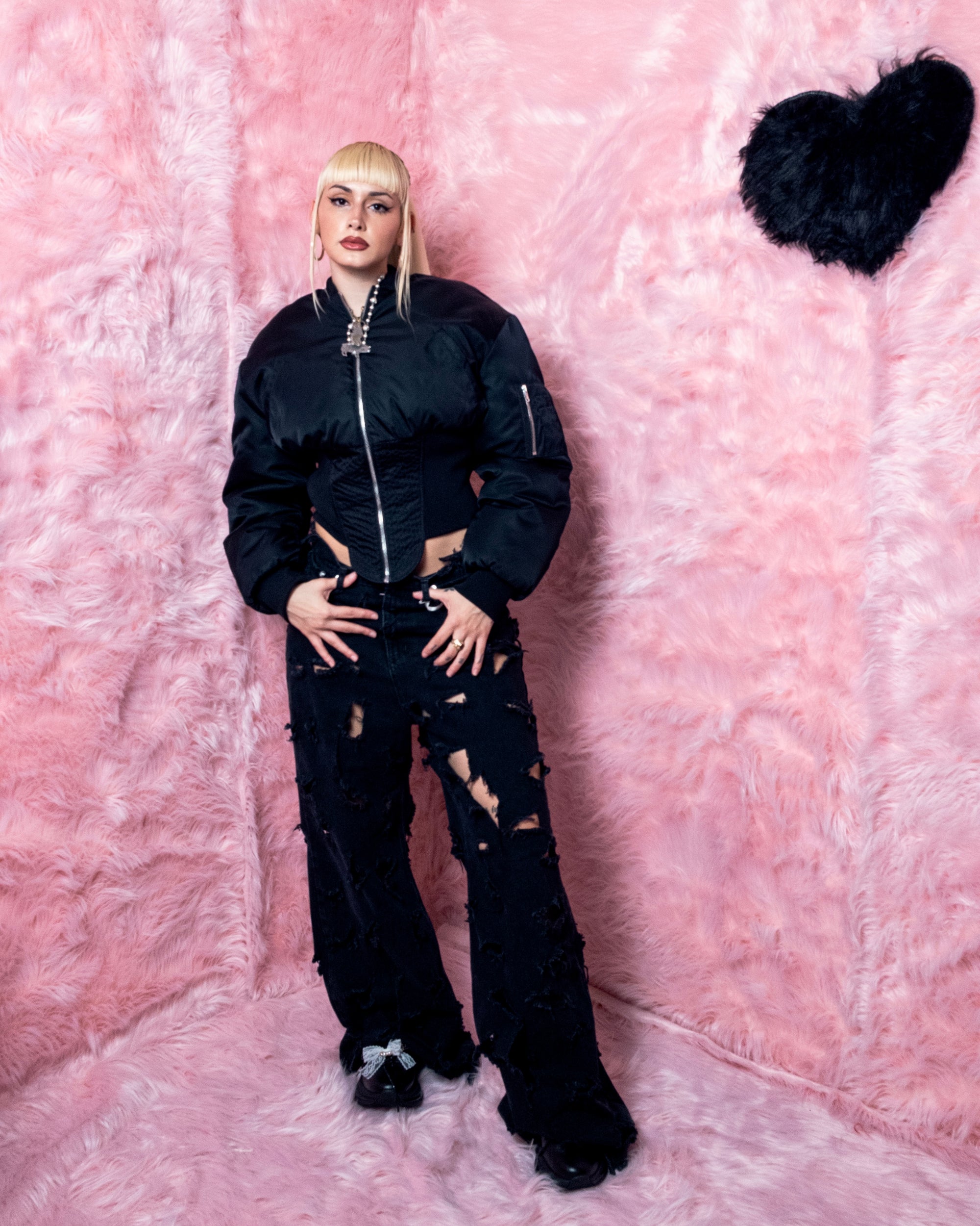 A person wearing incredibly styled clothes from ESSX NYC