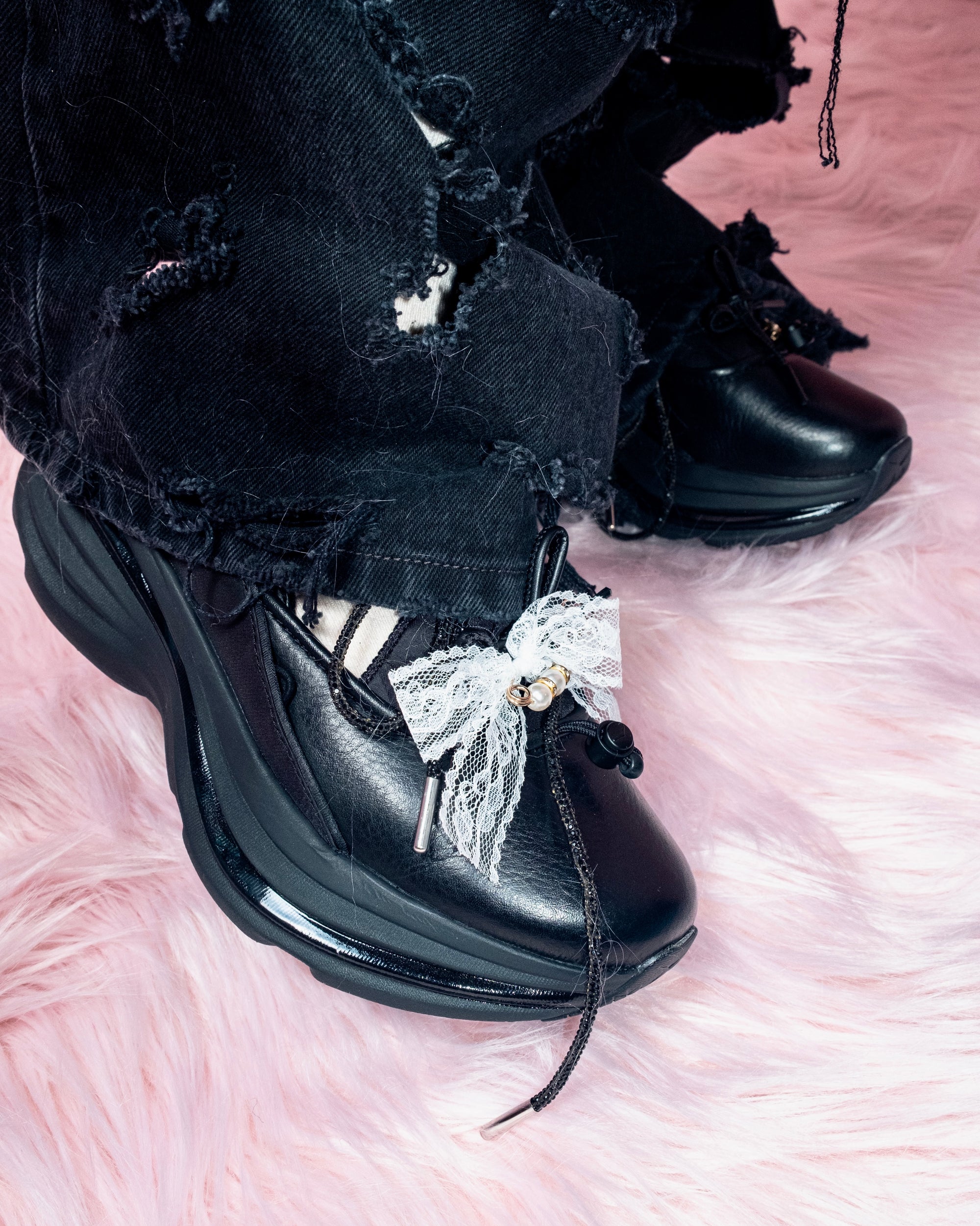 A person wearing incredibly styled clothes from ESSX NYC