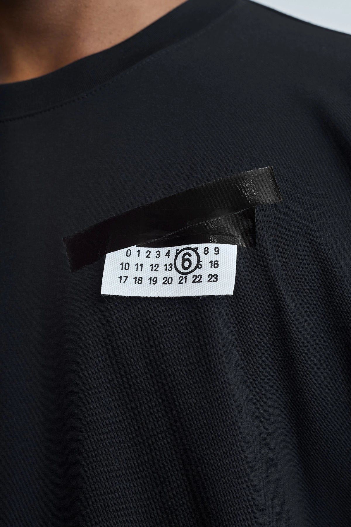MM6 Maison Margiela Logo Tape T-Shirt Black – ESSXNYC MM6 Maison Margiela Logo Tape T-Shirt Black – ESSXNYC