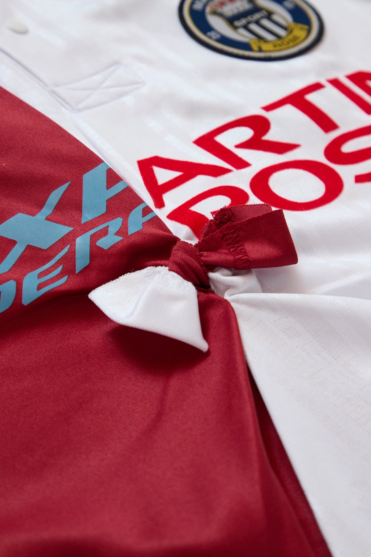 MARTINEROSECOLLEGEFOOTBALLTOP_1ATESSX