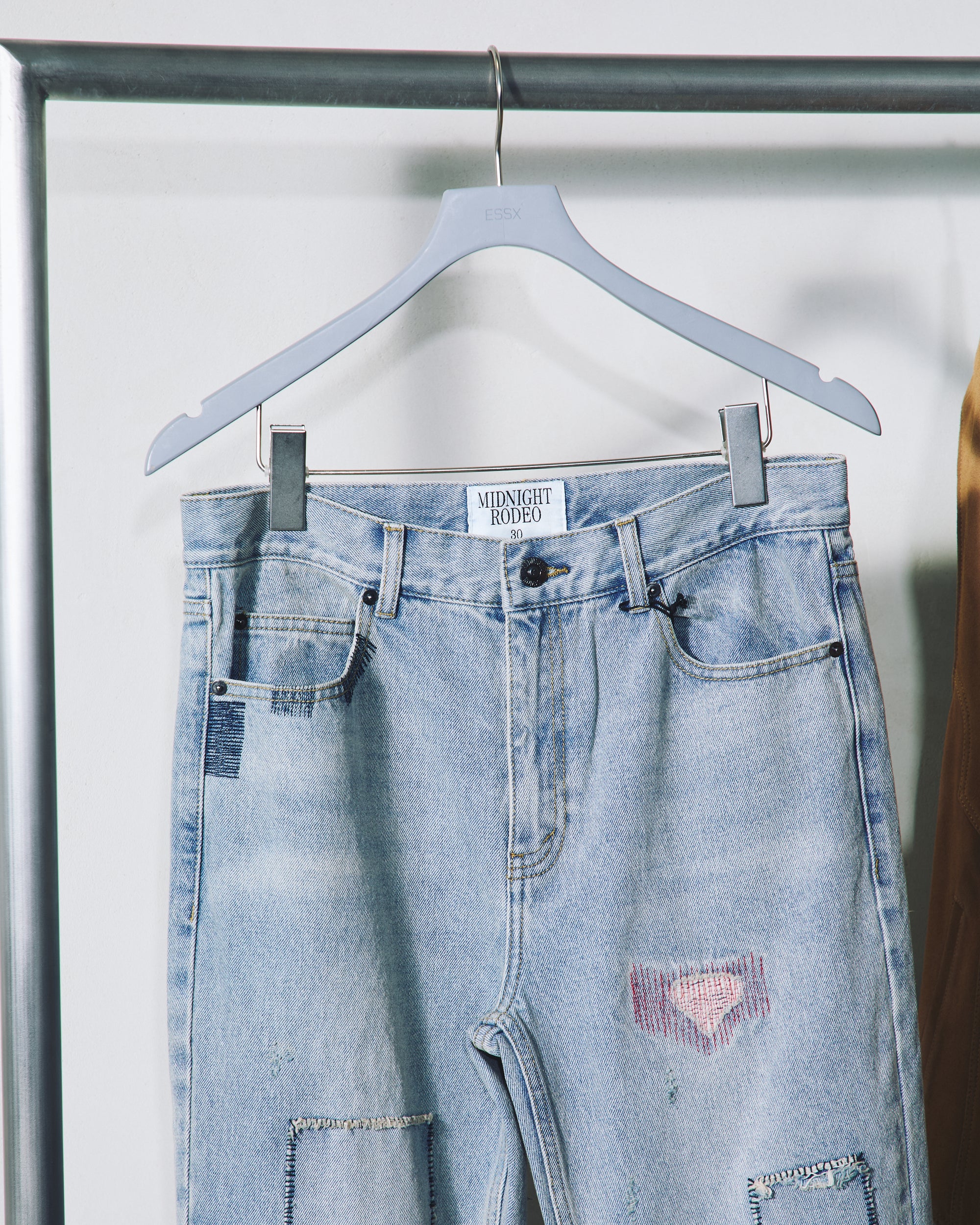 A person wearing incredibly styled clothes from ESSX NYC