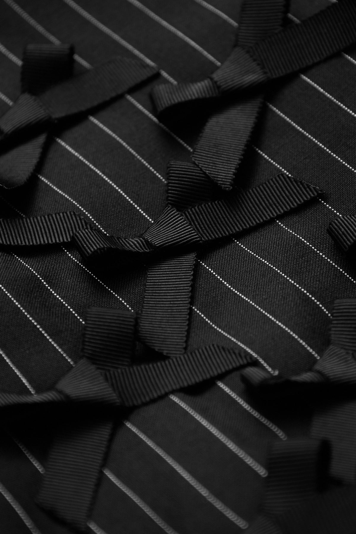 SOLOISTZIPUPBRITJKBLACKRIBBONS-Soloist-1