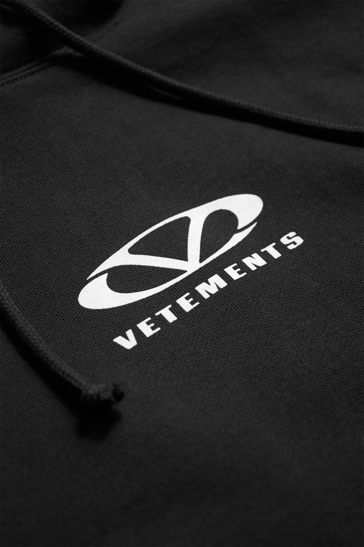 Vetements Oval Logo Cropped Boxy Hoodie Black – ESSXNYC Vetements Oval Logo Cropped Boxy Hoodie Black – ESSXNYC